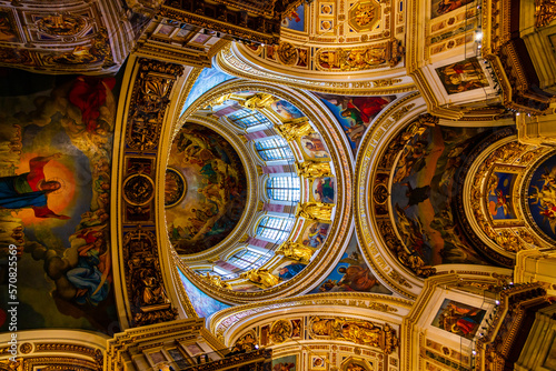 St. Peterburg  RUSSIA - AUGUST 25  2022  Russian Orthodox church with dome columns and golden interior decoration