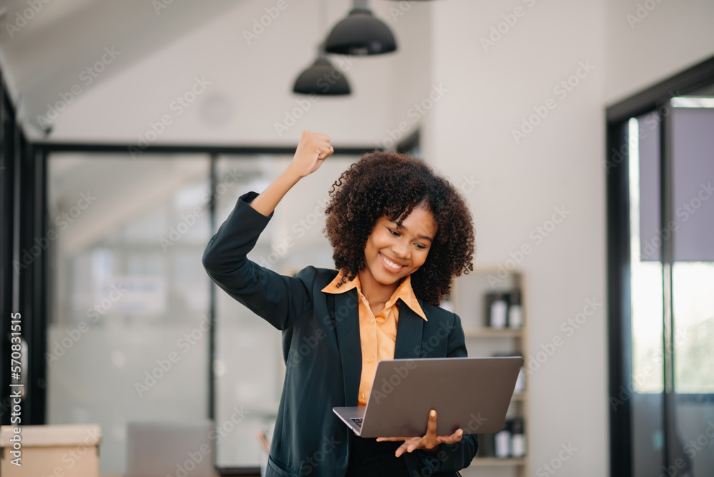 Asian business woman are delighted and happy with the work they do on their tablet, laptop and taking notes at the office.. Asian business woman are delighted and happy with the work they do on their tablet, laptop and taking notes at the office..