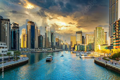 Photography Dubai Marina skyscrapers, port with luxury yachts and Marina promenade, Dubai, U