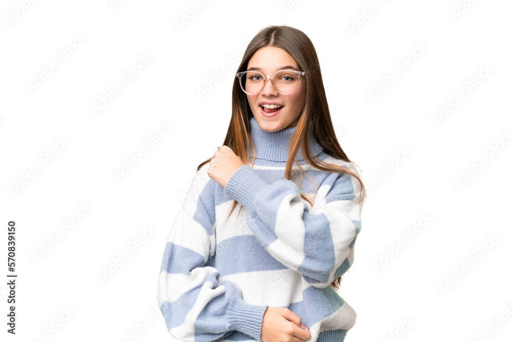 Teenager girl over isolated chroma key background celebrating a victory Teenager girl over isolated chroma key background celebrating a victory
