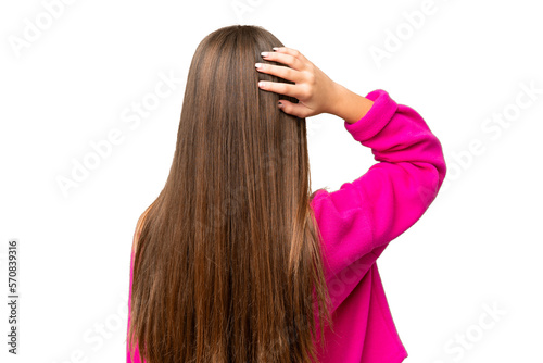 Teenager girl over isolated chroma key background in back position and thinking
