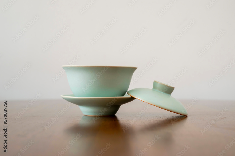 Green tea cups are isolated on the dining table