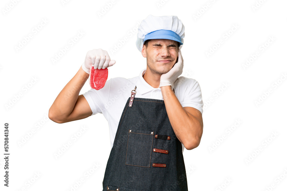 Butcher caucasian man wearing an apron and serving fresh cut meat over isolated background frustrated and covering ears Butcher caucasian man wearing an apron and serving fresh cut meat over isolated background frustrated and covering ears