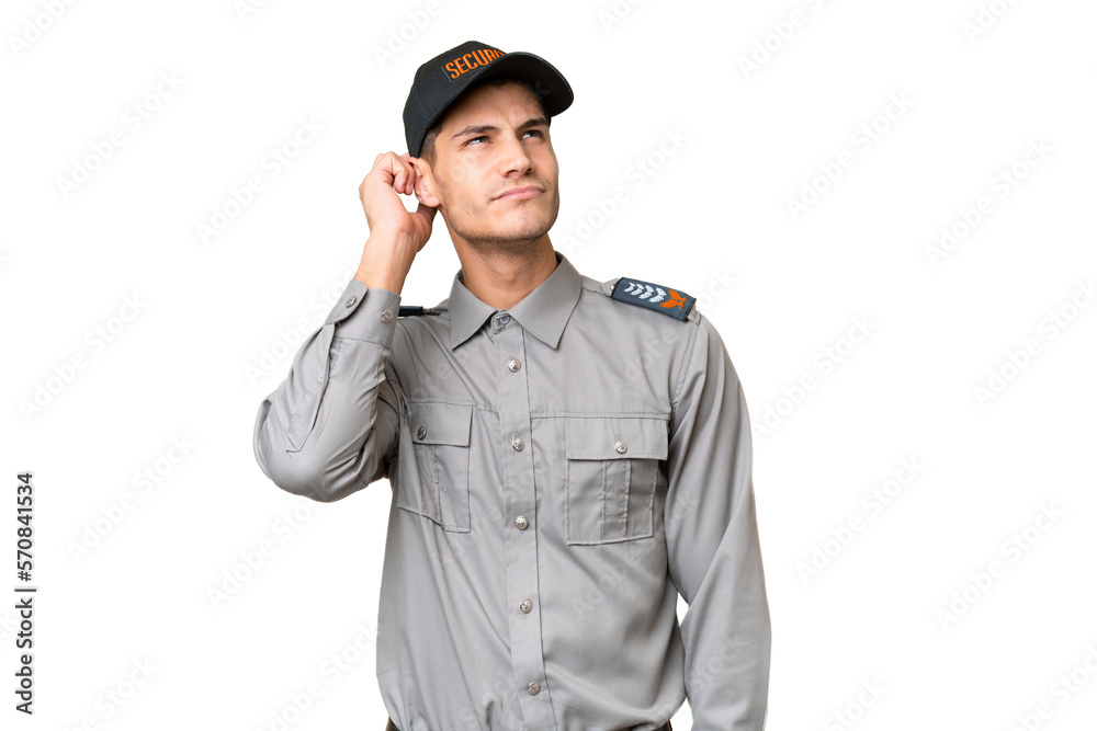 Young security man over isolated background having doubts and with confuse face expression Young security man over isolated background having doubts and with confuse face expression