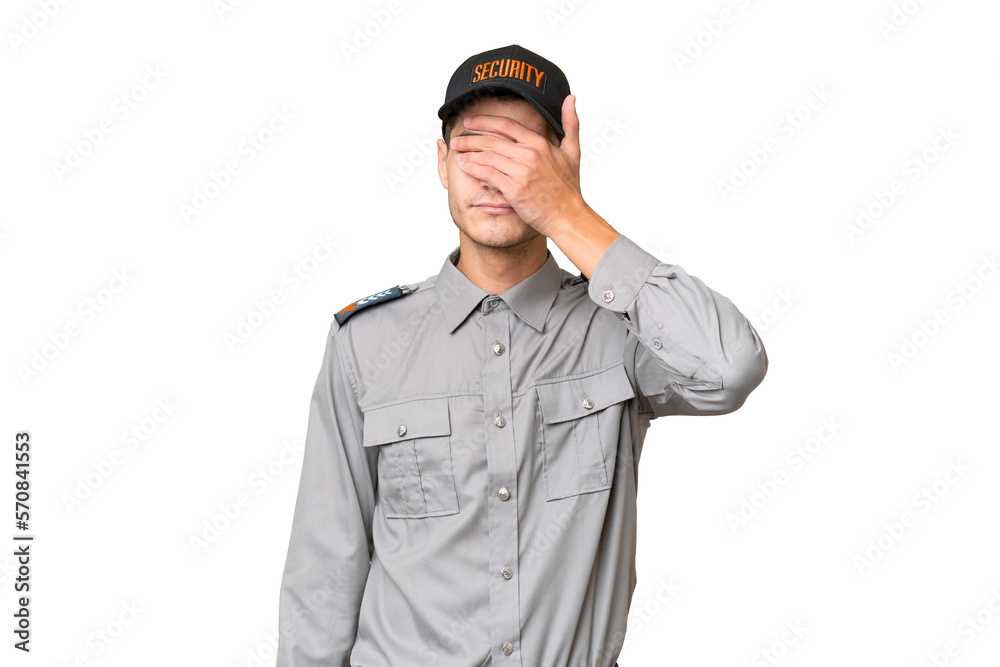 Young security man over isolated background covering eyes by hands. Do not want to see something Young security man over isolated background covering eyes by hands. Do not want to see something
