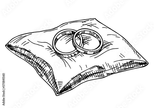 Pair of traditional wedding rings on exquisite pillow in vintage engraved, sketch style. Hand drawing of rings for bride and groom, symbol of eternal love. Illustration isolated on white background.