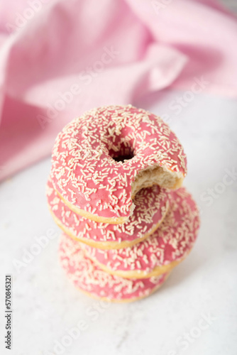 pink donuts, sweet dessert on a light background