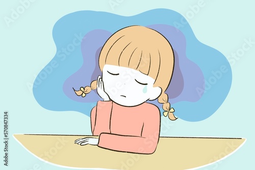 1人で悩み事を抱えて泣く女の子