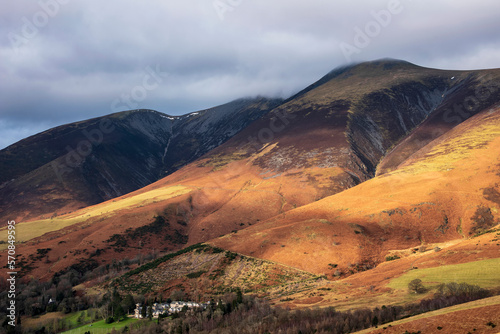 Stunnig colorful sunrise golden hour light on the slopes of Skiddaw in the English Lake District