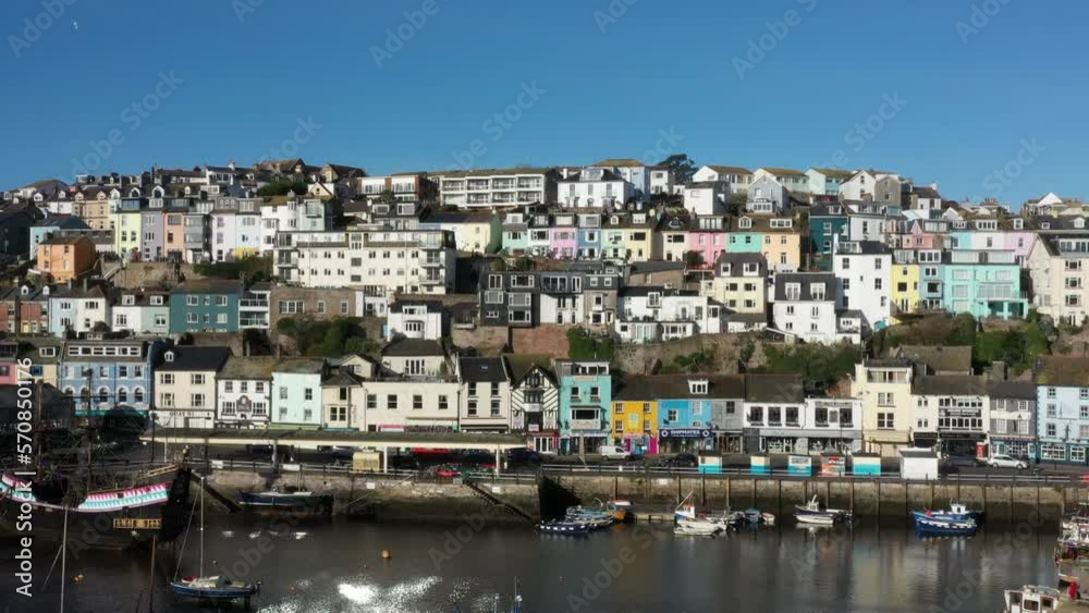 Aerial drone view of Brixham harbour in the sunshine tourist vacation seaside in Devon English riviera England UK 4K Aerial drone view of Brixham harbour in the sunshine tourist vacation seaside in Devon English riviera England UK 4K