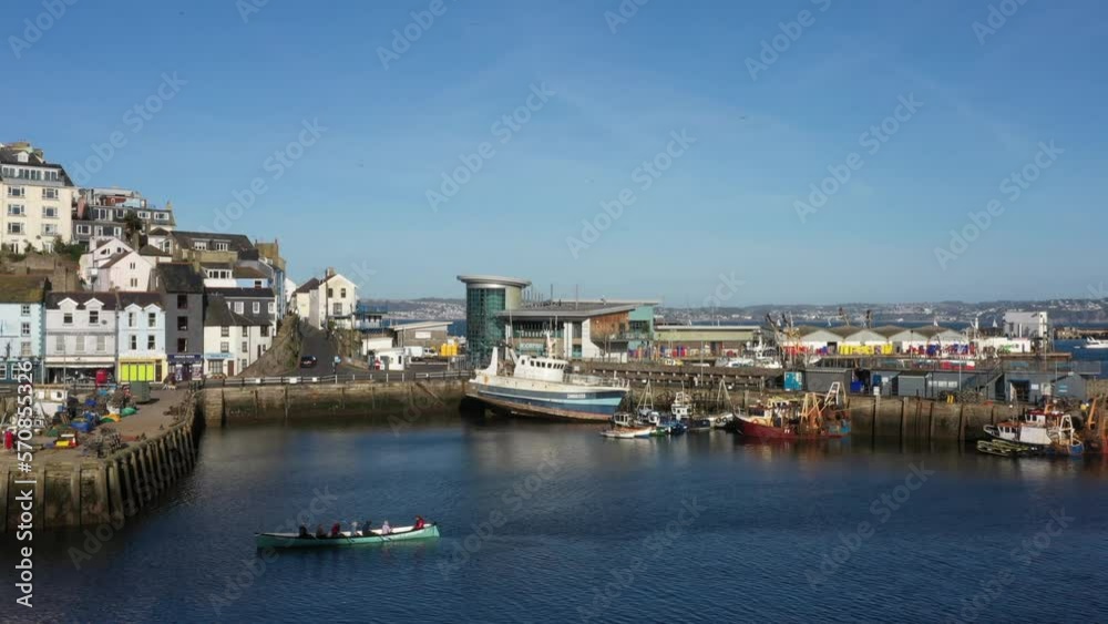 Aerial drone view of Brixham harbour in the sunshine tourist vacation seaside in Devon English riviera England UK 4K Aerial drone view of Brixham harbour in the sunshine tourist vacation seaside in Devon English riviera England UK 4K