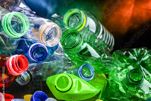 Empty colored drink bottles. Recyclable plastic waste photo