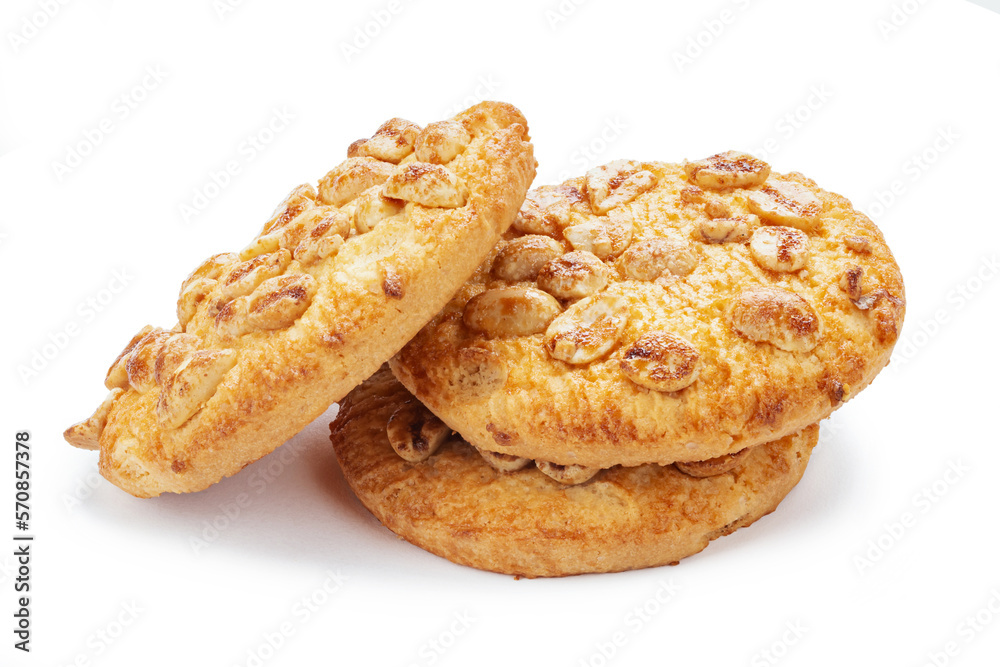 Round fresh cookie caramel with peanuts isolated on white background. Delicious peanut circle shaped cookies. Round fresh cookie caramel with peanuts isolated on white background. Delicious peanut circle shaped cookies.