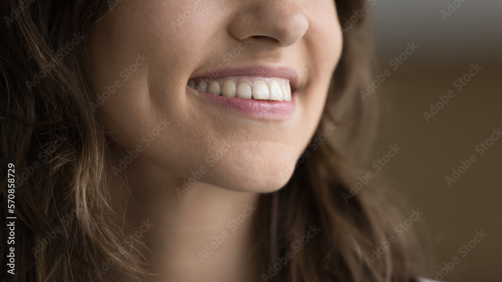 Toothy smile of happy pretty young Caucasian woman close up. Lower face, healthy white teeth of dental clinic patient promoting dentist service, enamel cleaning, bleaching, dental care, correction Toothy smile of happy pretty young Caucasian woman close up. Lower face, healthy white teeth of dental clinic patient promoting dentist service, enamel cleaning, bleaching, dental care, correction