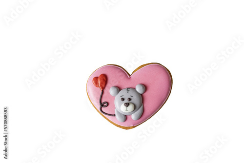 Gingerbread in the shape of a heart with a muzzle of Meldvedenko. Romantic cookies. Isolate on white. PNG