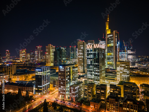 aerial view of the illuminated skyscrapers in the city at night, frankfurt main, germany