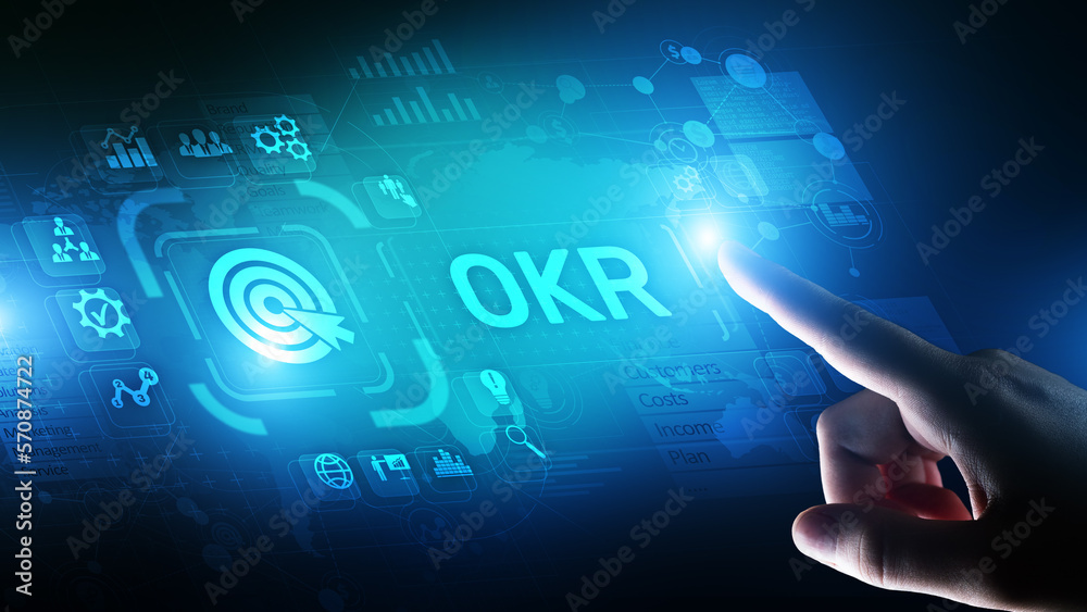 Objective Key Results Business technology process improvement concept on virtual screen. Objective Key Results Business technology process improvement concept on virtual screen.