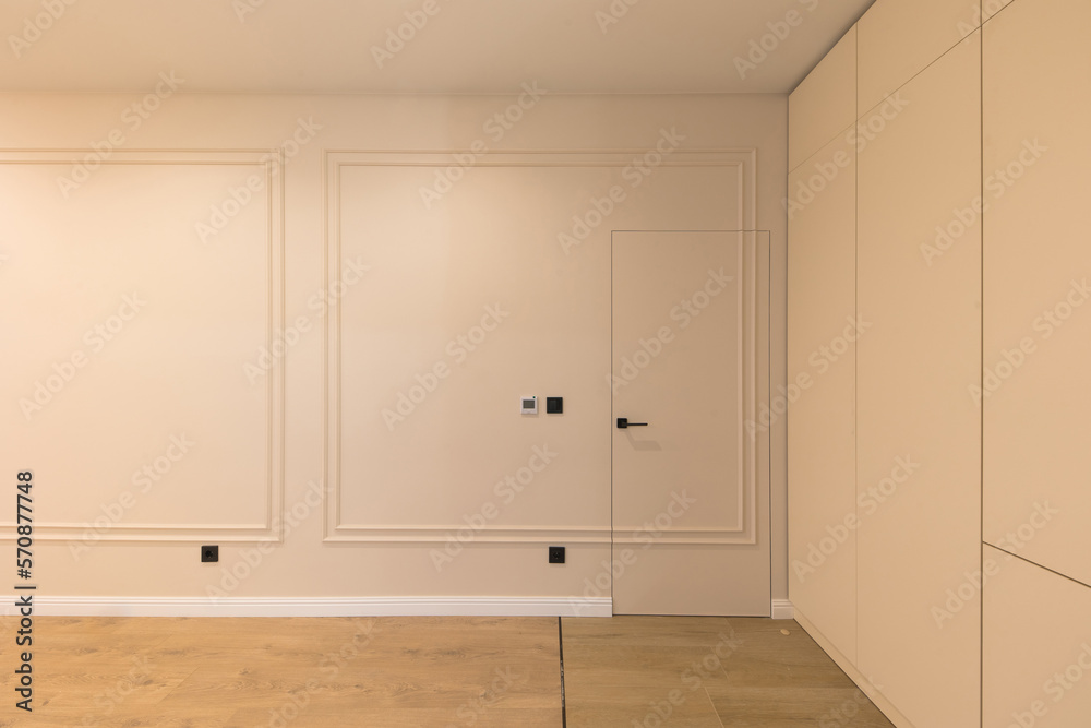 Designer wall in a modern interior. White room.