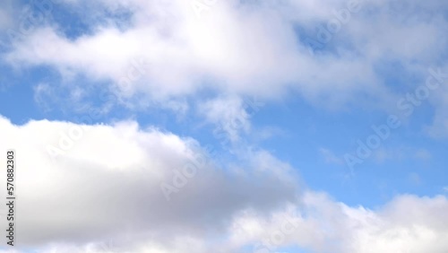 Close-up of passing clouds on blue sky during windy day, nature landscape, video 4k resolution
