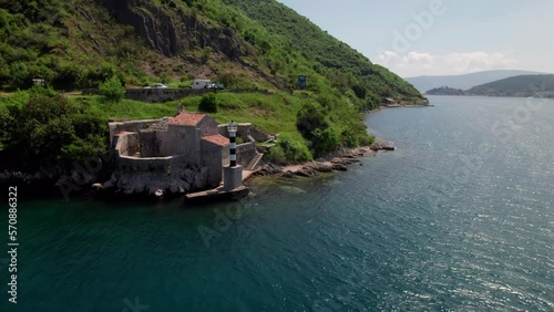 The Church of Our Lady of Angels at the very entrance to Verige Strait, Bay of Kotor Montenegro photo