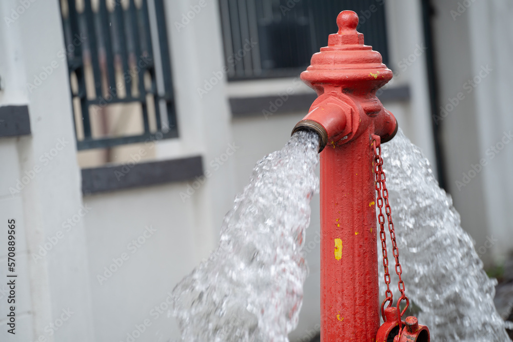 Fire hydrant being flushed by for maintenance. Fire hydrant leaking