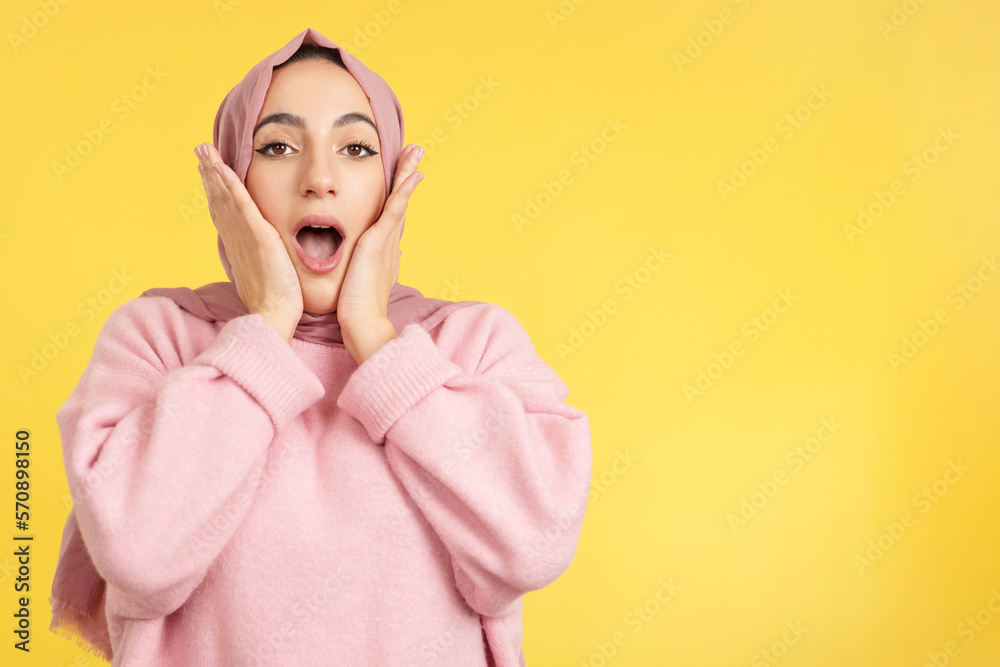 Surprised muslim woman looking at the camera Surprised muslim woman looking at the camera