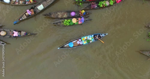 Floating Market in Indonesia, Lok Baintan Floating Market, Sellers and Buyers Using Ships in Their Activities. Traditional Floating Market in Indonesia photo