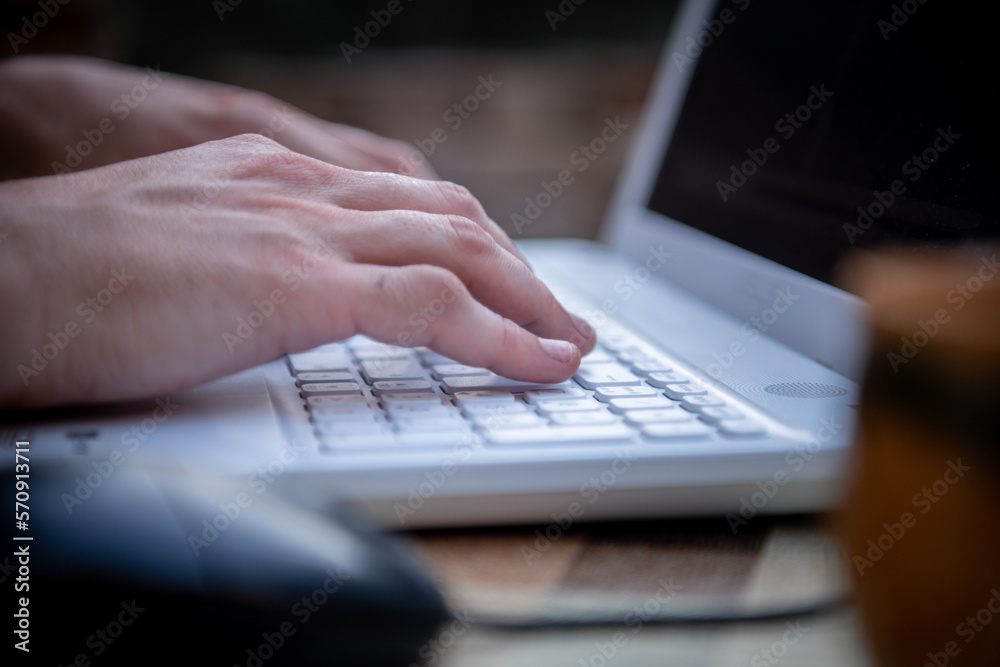 Man Using his Laptop