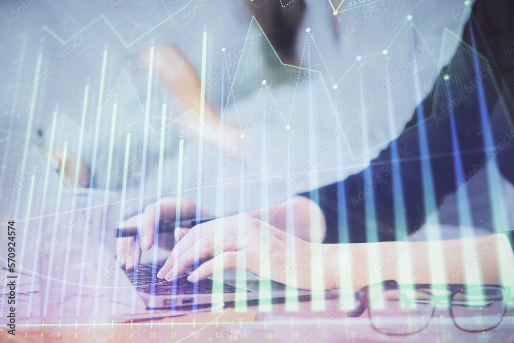 Multi exposure of woman hands typing on computer and financial graph hologram drawing. Stock market analysis concept. Multi exposure of woman hands typing on computer and financial graph hologram drawing. Stock market analysis concept.