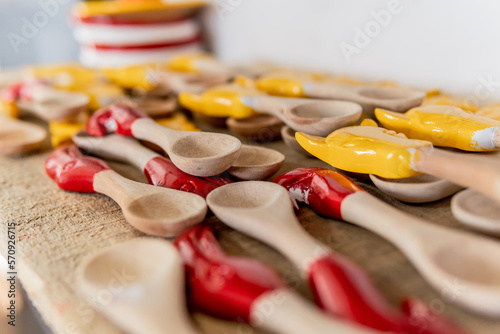 wooden spoons with painted animal shapes photo