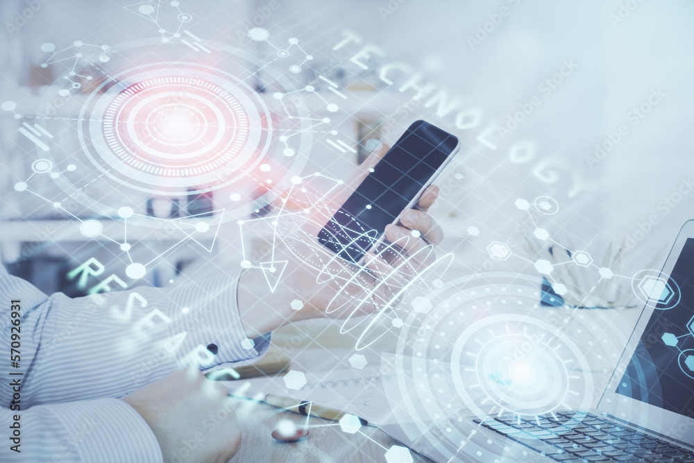 Double exposure of man's hand holding and using a digital device and data theme hologram drawing. Technology concept. Double exposure of man's hand holding and using a digital device and data theme hologram drawing. Technology concept.