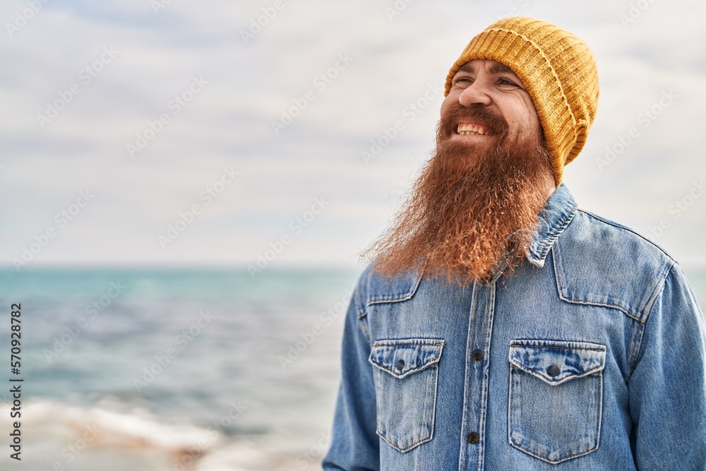 Young redhead man smiling confident standing at seaside Young redhead man smiling confident standing at seaside