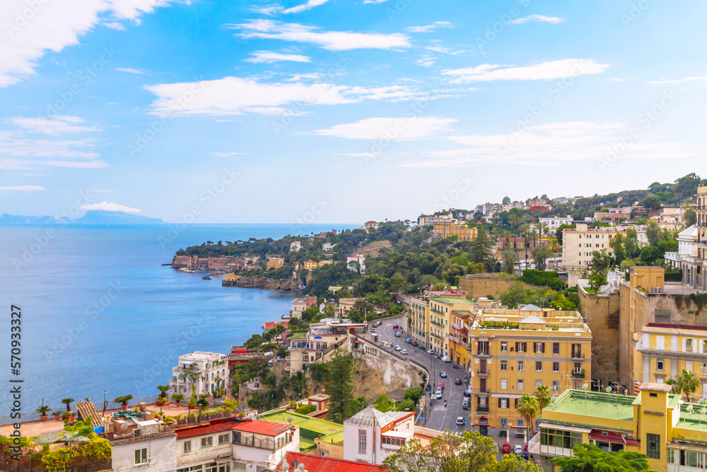 Scenic coastline of Naples. Blue sea with islands on the skyline. View from the top of hill