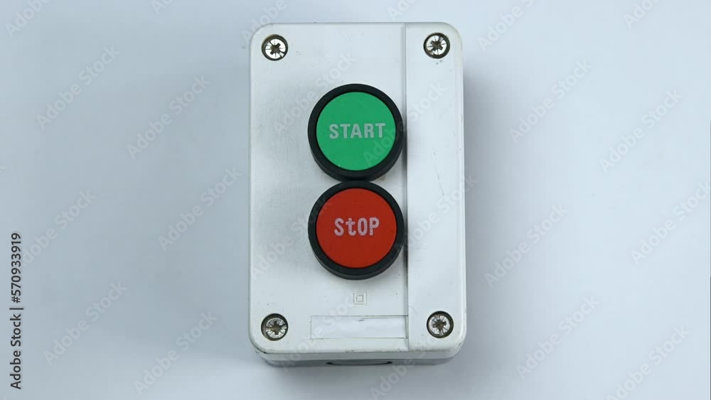 The finger presses the start button. Two buttons in the case, green - start switch, red - stop switch The finger presses the start button. Two buttons in the case, green - start switch, red - stop switch