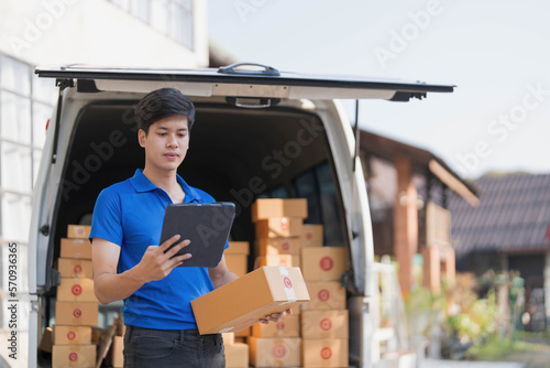 Billede på lærred Asian courier with parcel and delivery logistic concept