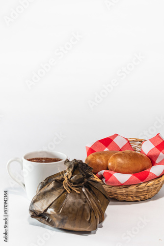 lunch of Tamale, chocolate and bread white background Vertical photo photo