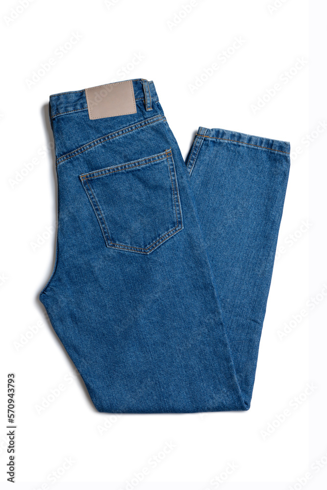 Blue jeans pants isolated on white background. Denim background, texture. Fashion concept, business, shopping, sale. Design detail, button and seams Blue jeans pants isolated on white background. Denim background, texture. Fashion concept, business, shopping, sale. Design detail, button and seams