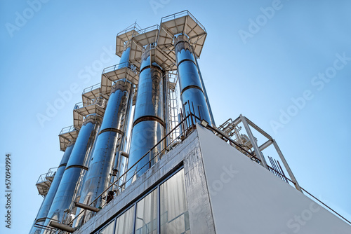 Industrial metal turbine against the background of the blue sky