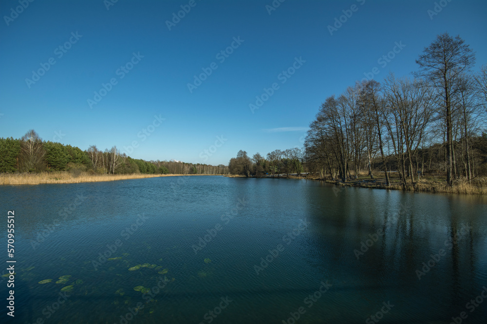The end of winter, a small dam reservoir, a fishing ground in Poland.