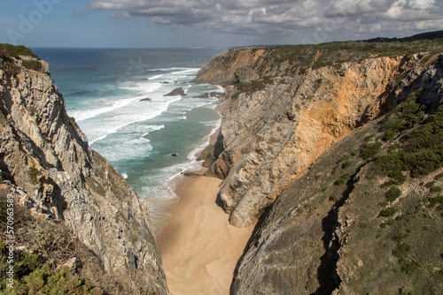 Praia da Adraga beach and rock cliffs from above photo