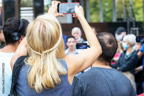Bilde på lerret Citizen or mobile journalist filming and photographing media event or news confe