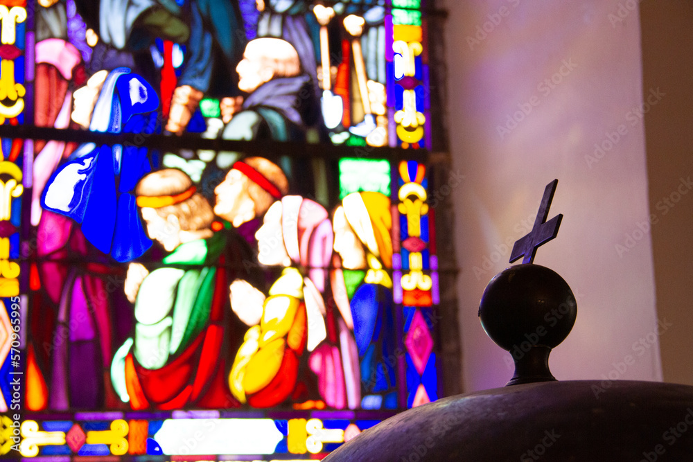 Fototapeta premium Sacred Light – Cross and Stained Glass Reflection