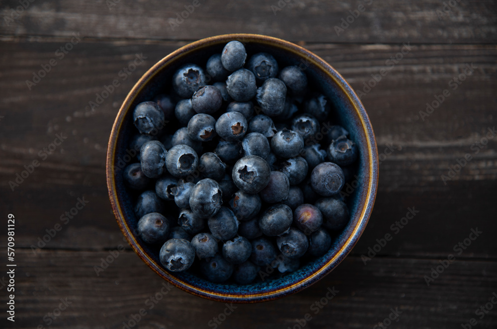 blueberries in a bowl on table blueberries in a bowl on table