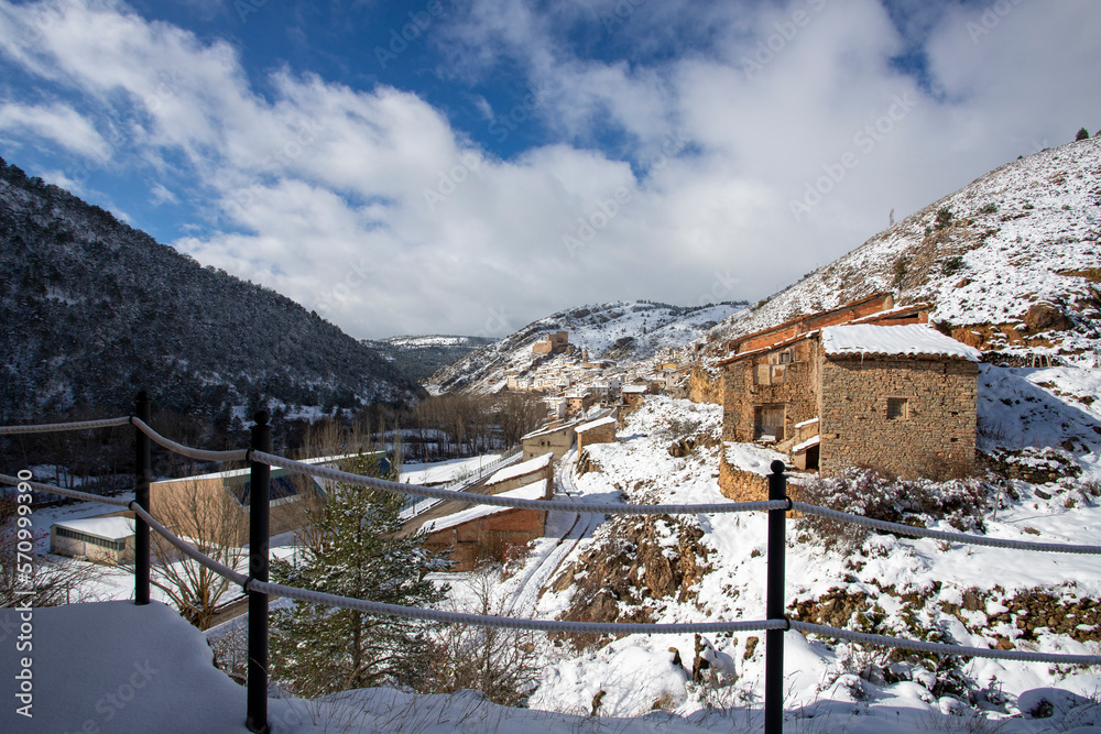 Snow covered Alcala de la Selva village  in Gudar mountains Teruel Aragon Spain