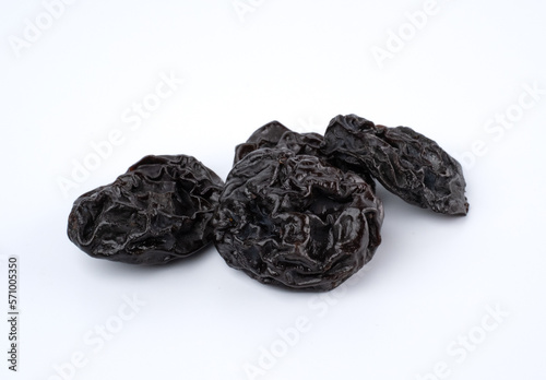 Prunes isolated On White Background. Black Dried Fruit.