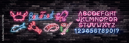 Vector set of realistic isolated neon sign of Sea Food logo with easy to change color alphabet font on the wall background.