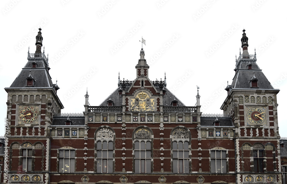Amsterdam Central station building on a clouded day with white sky