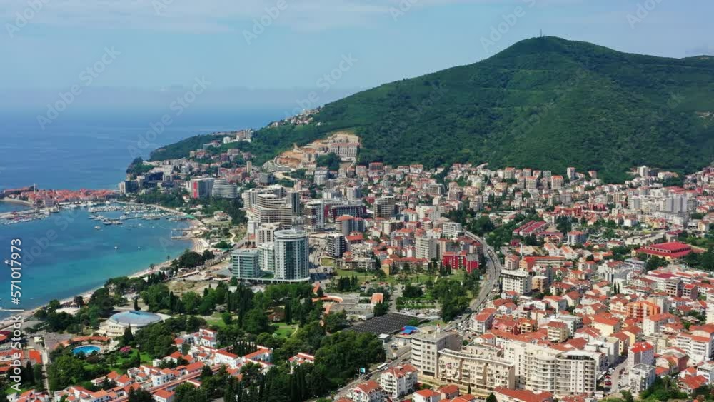 Aerial view of Budva city. Boats in Adriatic sea, Montenegro, panorama 4k Aerial view of Budva city. Boats in Adriatic sea, Montenegro, panorama 4k