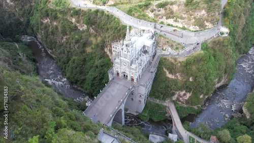 Drone view of the National Shrine Basilica of Our Lady of Las Lajas over the Guáitara River in Narino Department of Colombia in Ipiales, considered one of the most beautiful churches in the world photo