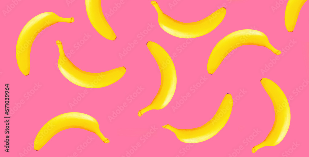 Stylish creative image yellow banana on pink background Stylish creative image yellow banana on pink background